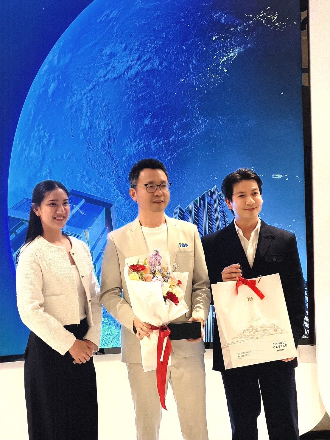 Nico Luo with partners at an event